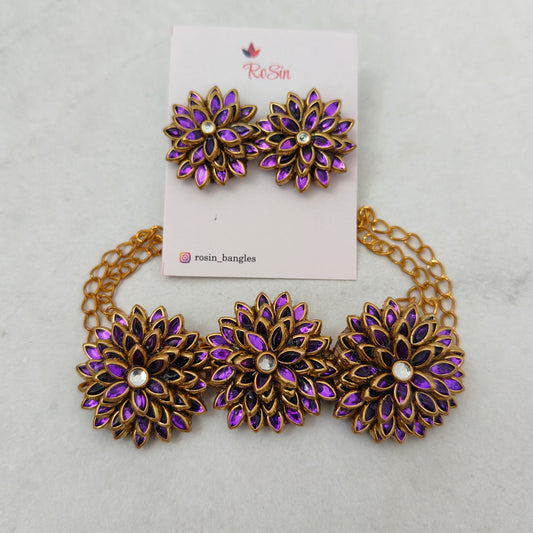 Purple necklace with earrings