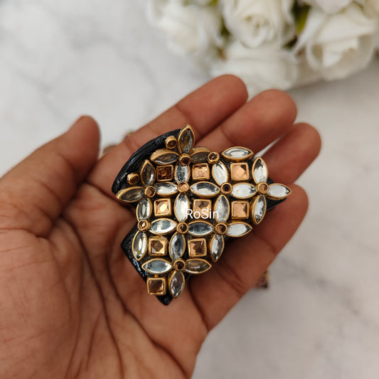 Gold and white clutch