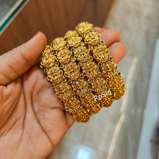 Gold lakshmi border bangles