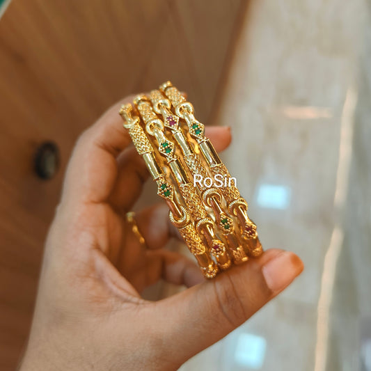 Gold lookalike imitation bangles(4 bangles)