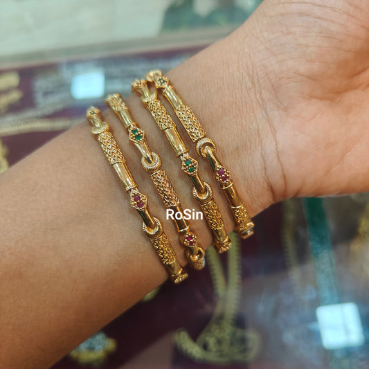 Gold lookalike imitation bangles(4 bangles)