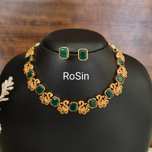 Gold peacock and emerald necklace