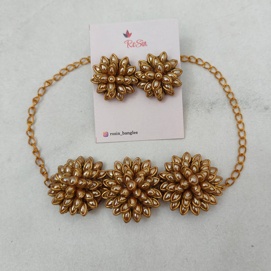 Golden pearl floral necklace and earrings 3d