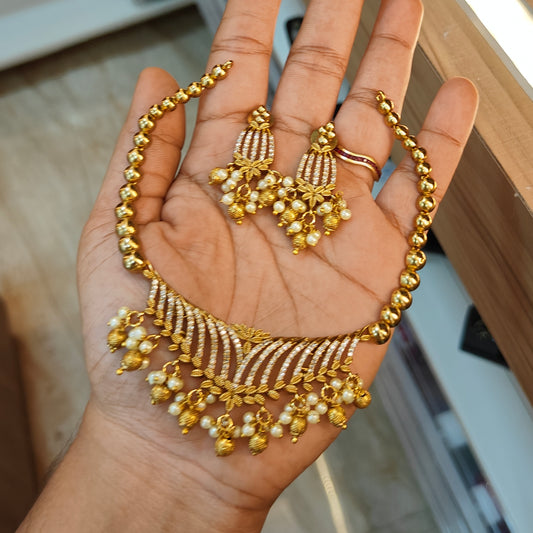 Fancy gold replica necklace