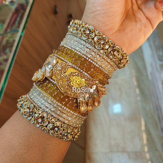 Intricate golden and white peacock set