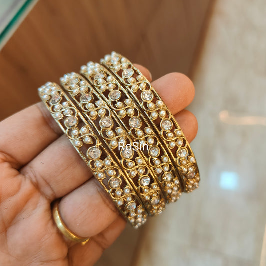 Pearl metal bangles (4)