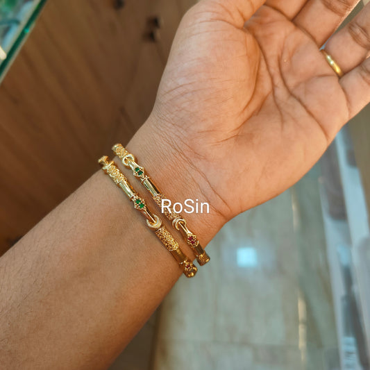 Gold lookalike imitation bangles(4 bangles)