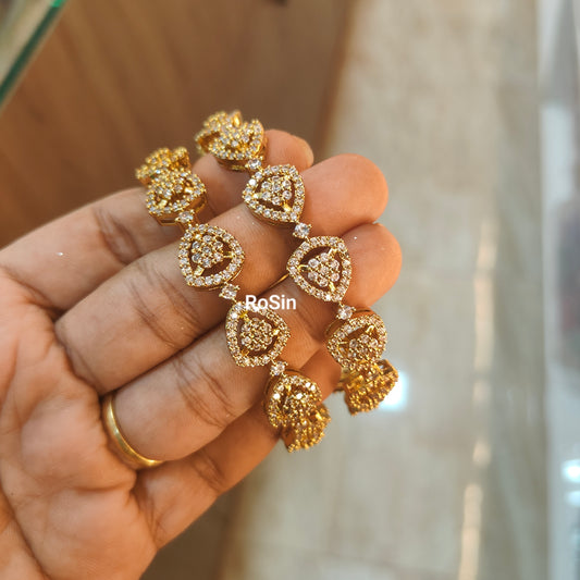 Gold tone diamond finish stone bangles (2)