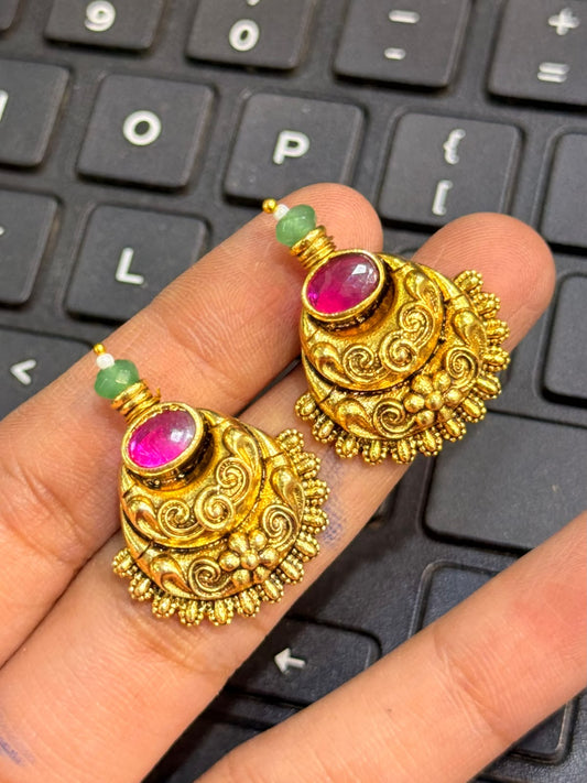 Beautiful statement earrings with Ruby stone and green bead