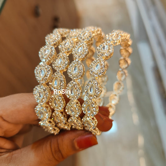 Diamond replica border metal bangles (4 piece)
